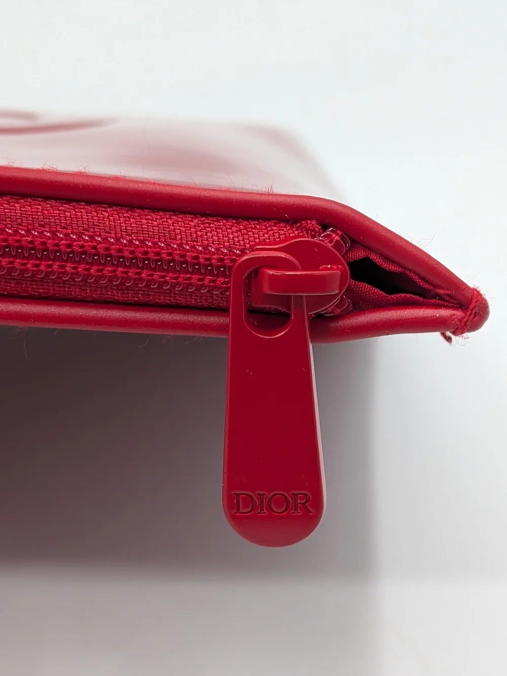 Red Patent Cosmetic Pouch — Designer Embossed Logo